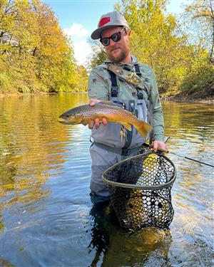 Dylan catching a VT Brown Trout